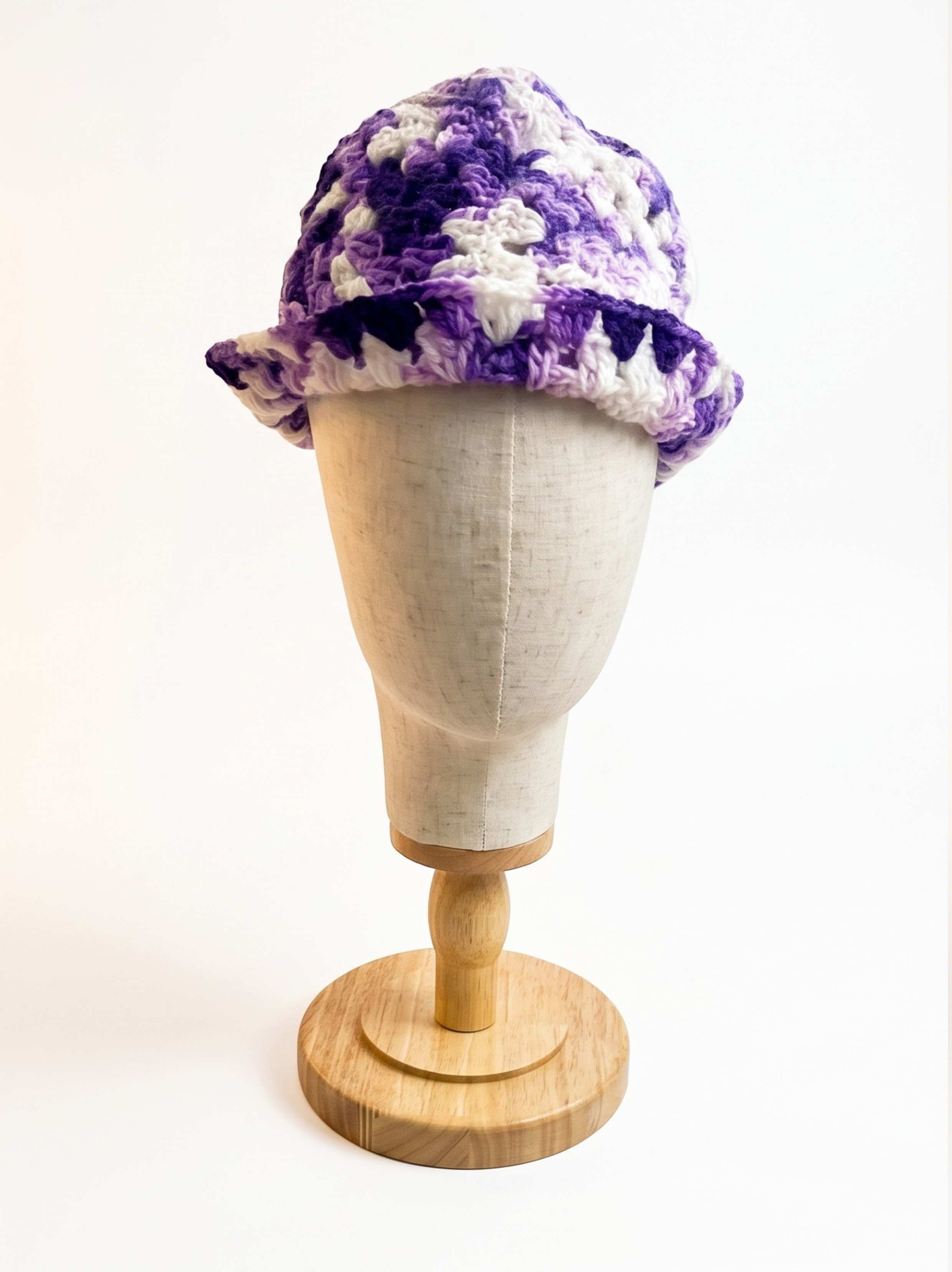 Purple, lavender, and white variegated crochet bucket hat